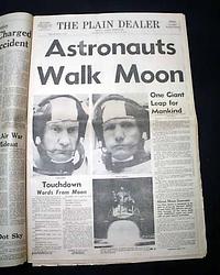 Man walks on the moon: two great front pages...